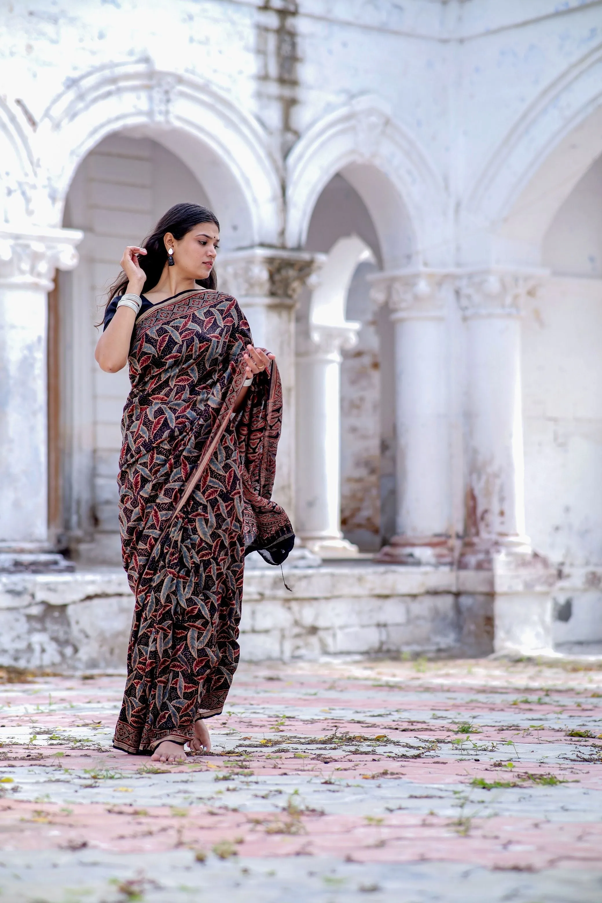 A trsyt with Ajrakh -Jharokha -Leaf Black chanderi ajrakh saree