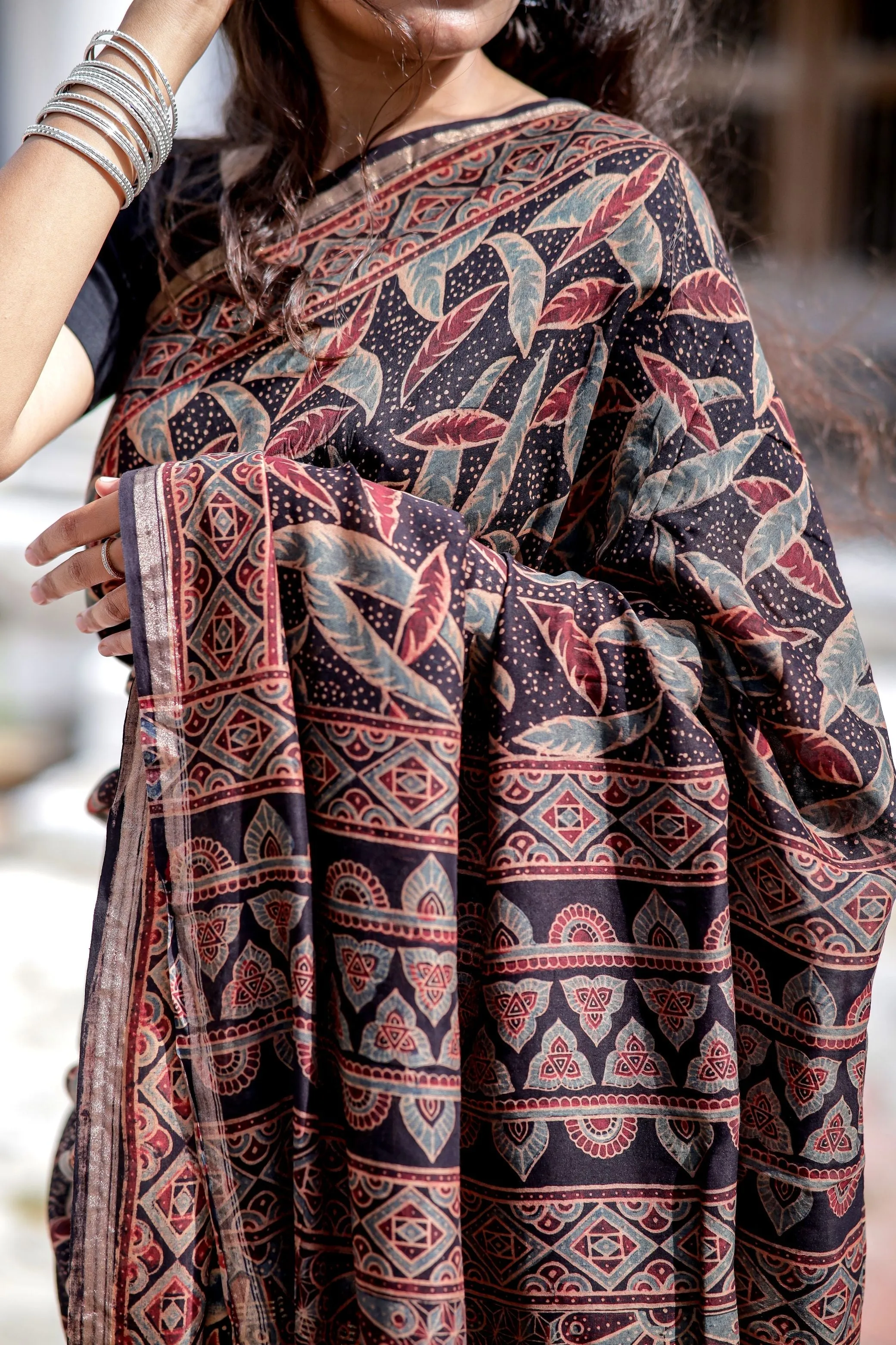 A trsyt with Ajrakh -Jharokha -Leaf Black chanderi ajrakh saree