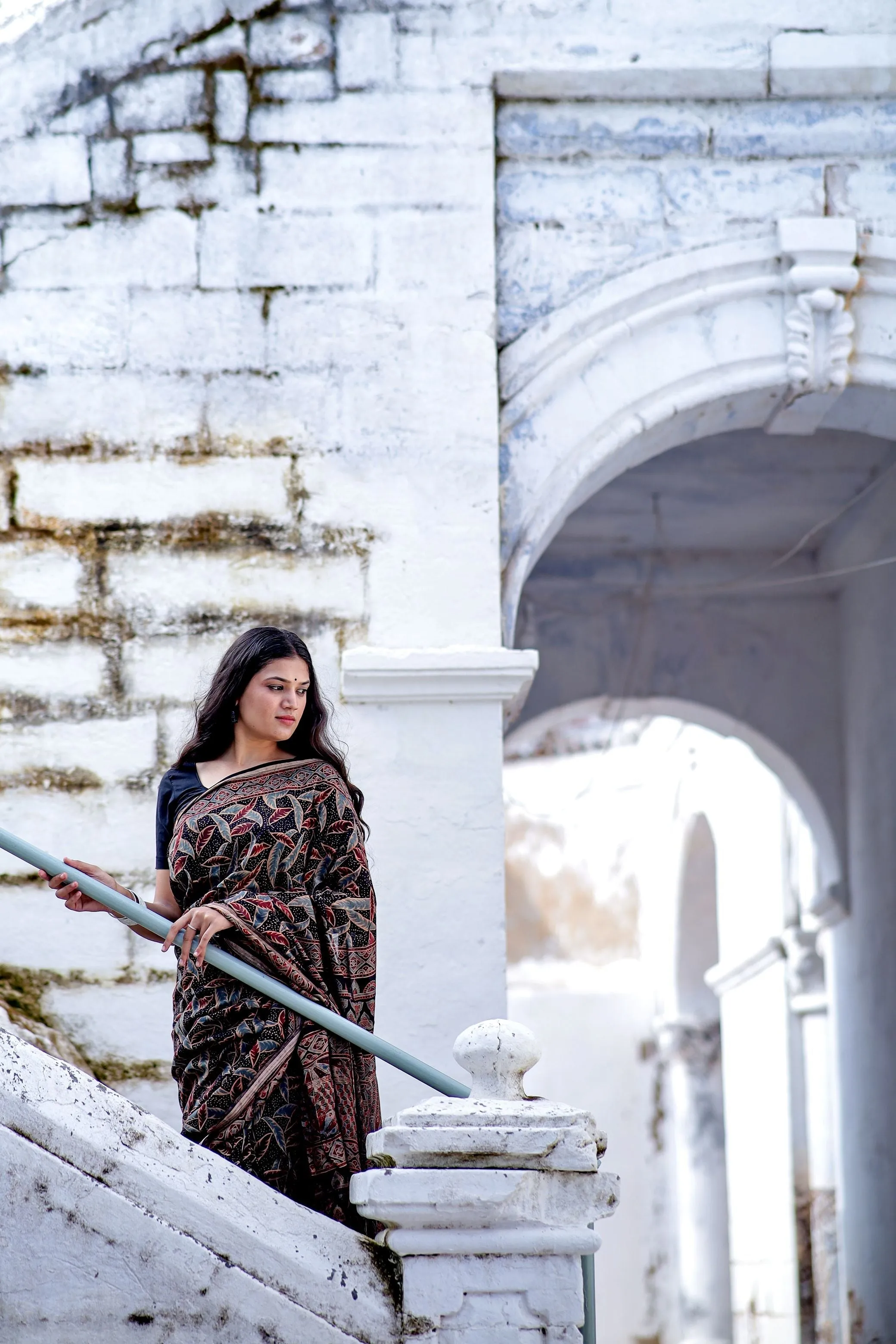 A trsyt with Ajrakh -Jharokha -Leaf Black chanderi ajrakh saree