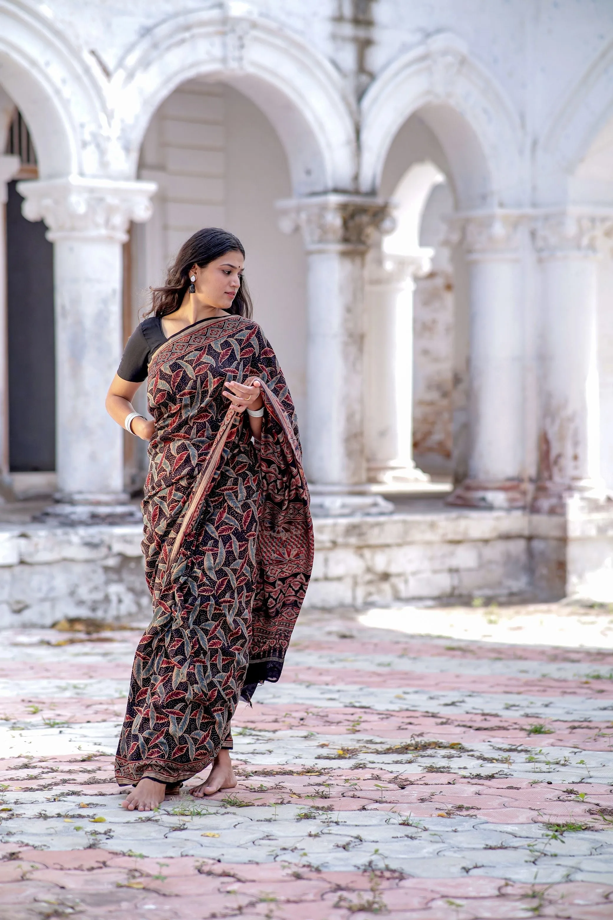A trsyt with Ajrakh -Jharokha -Leaf Black chanderi ajrakh saree