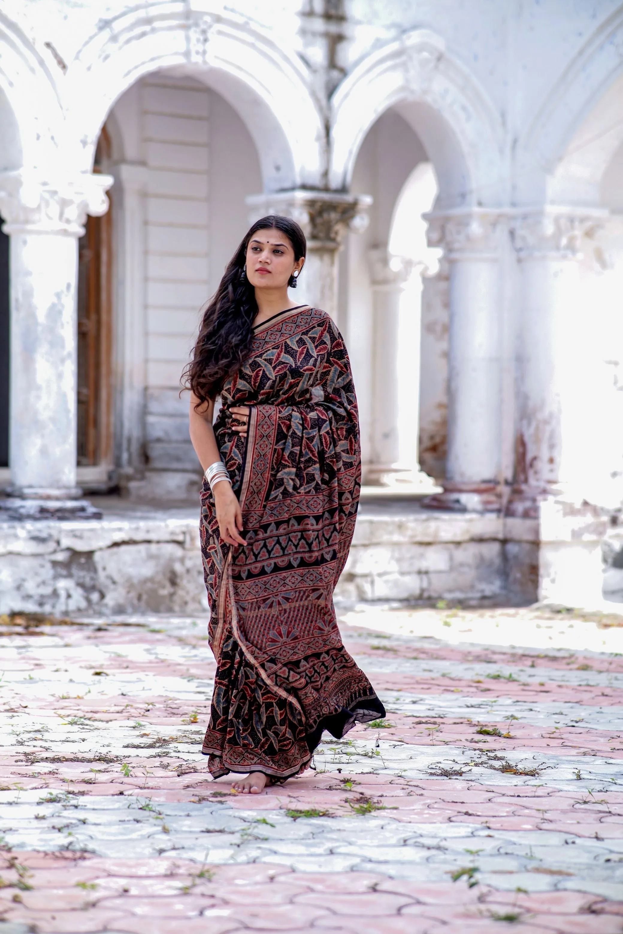 A trsyt with Ajrakh -Jharokha -Leaf Black chanderi ajrakh saree
