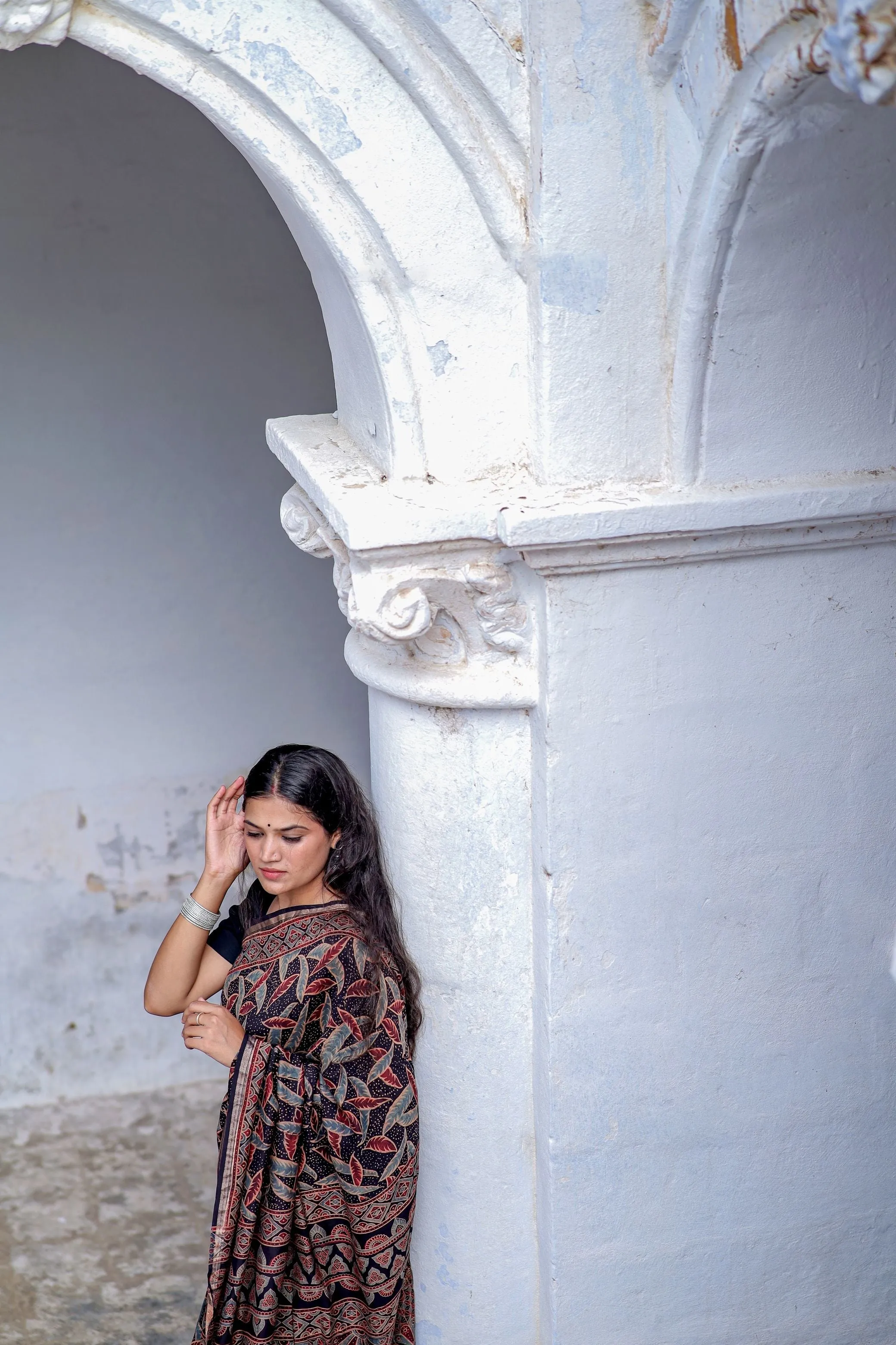 A trsyt with Ajrakh -Jharokha -Leaf Black chanderi ajrakh saree