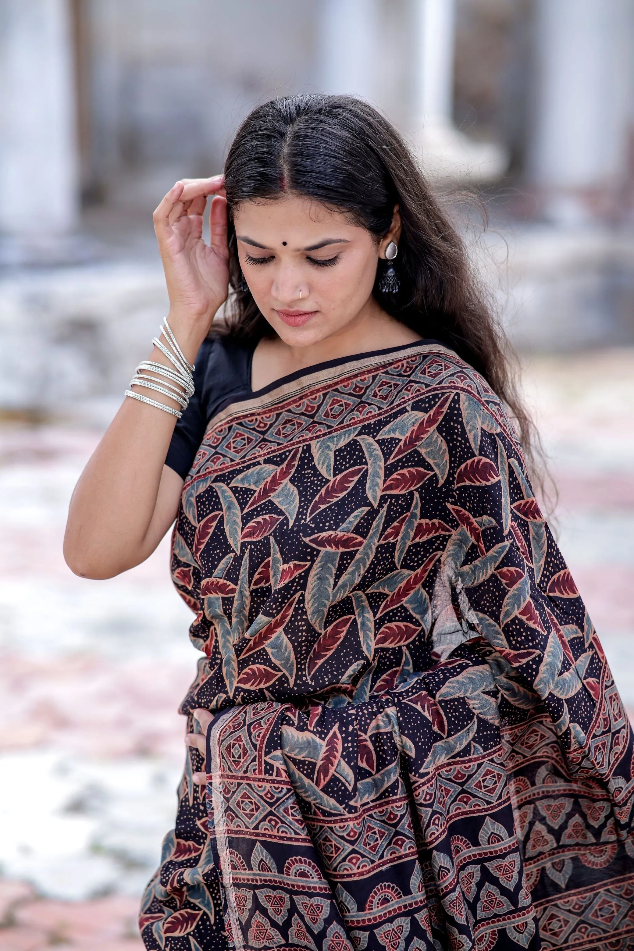 A trsyt with Ajrakh -Jharokha -Leaf Black chanderi ajrakh saree