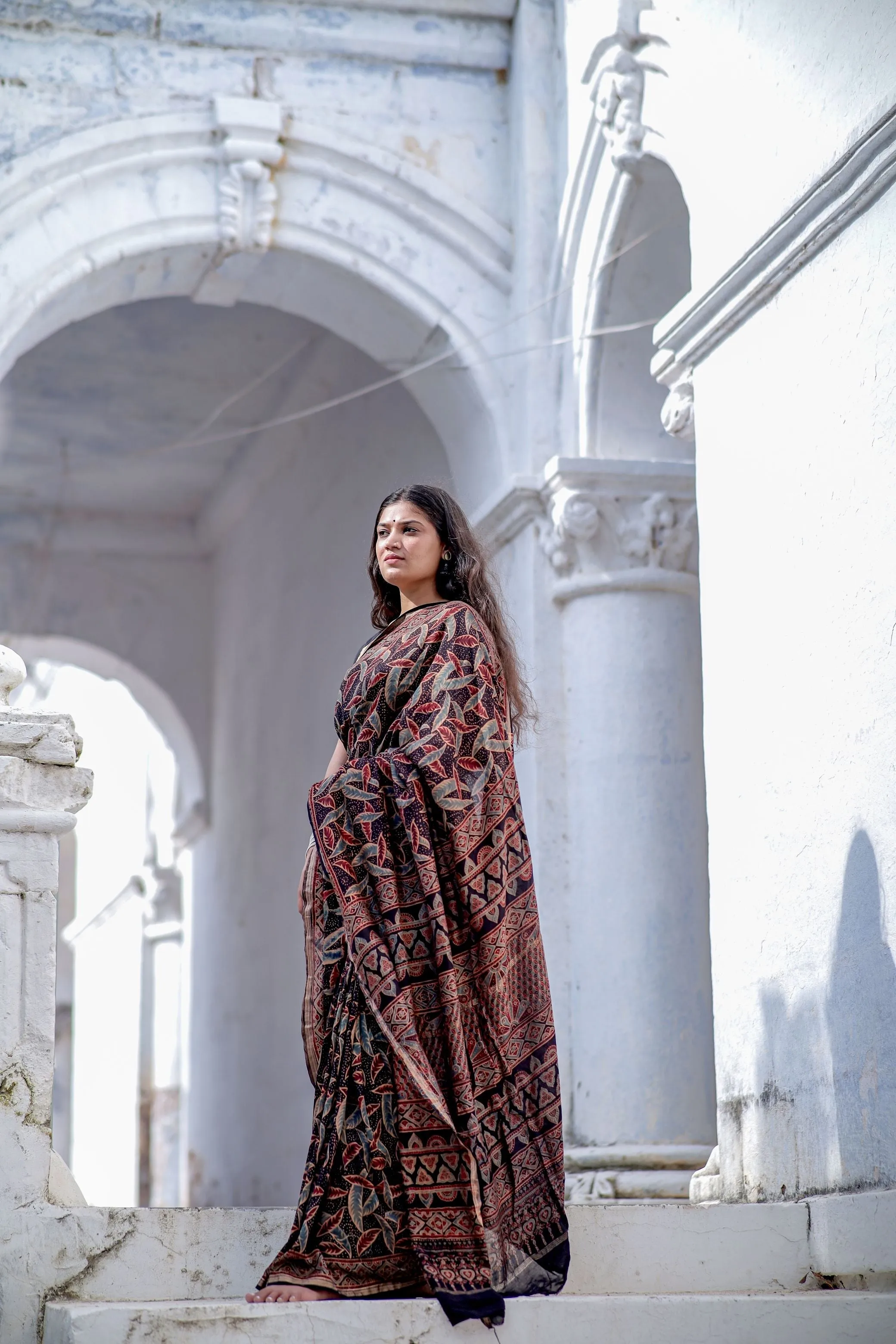 A trsyt with Ajrakh -Jharokha -Leaf Black chanderi ajrakh saree
