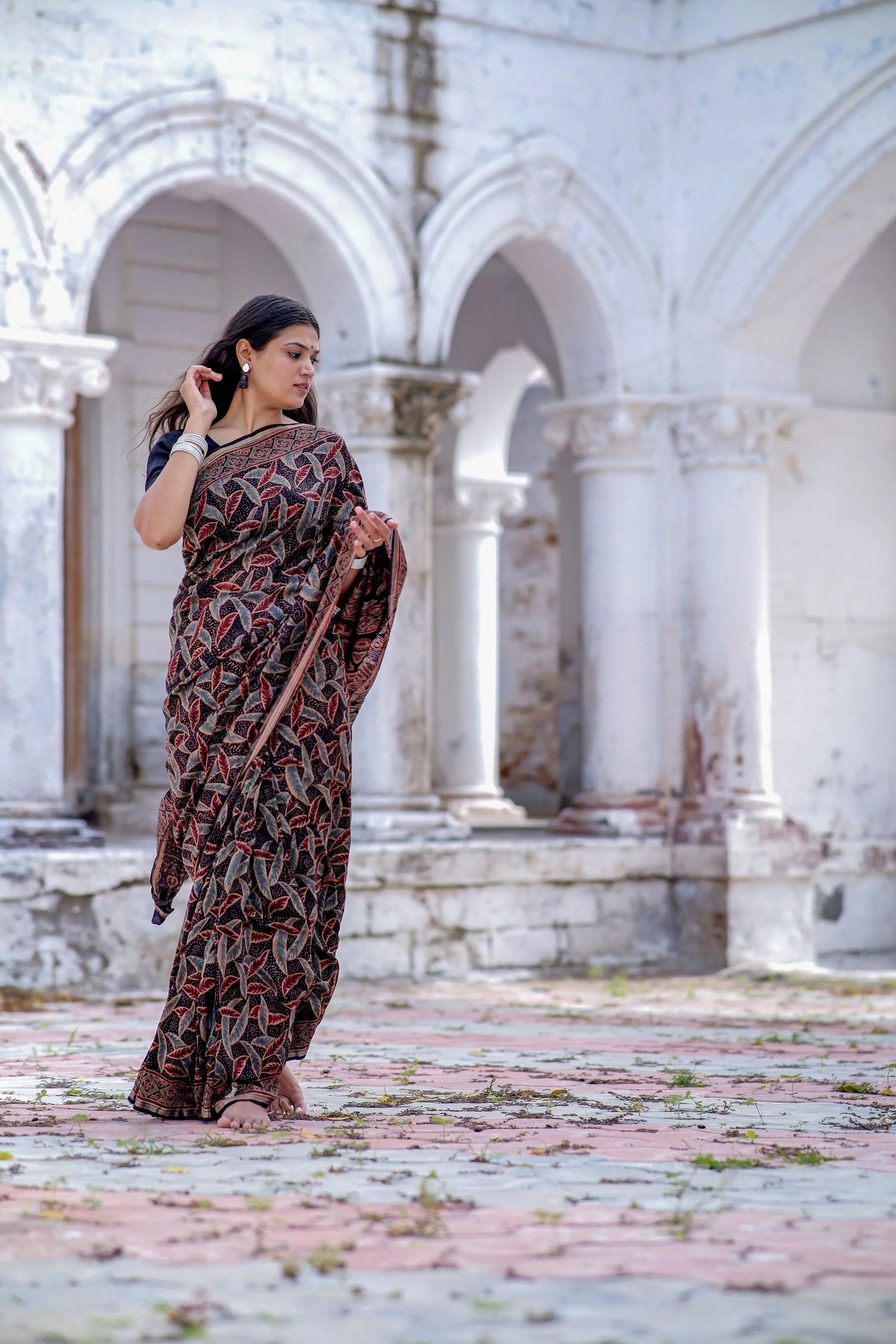 A trsyt with Ajrakh -Jharokha -Leaf Black chanderi ajrakh saree