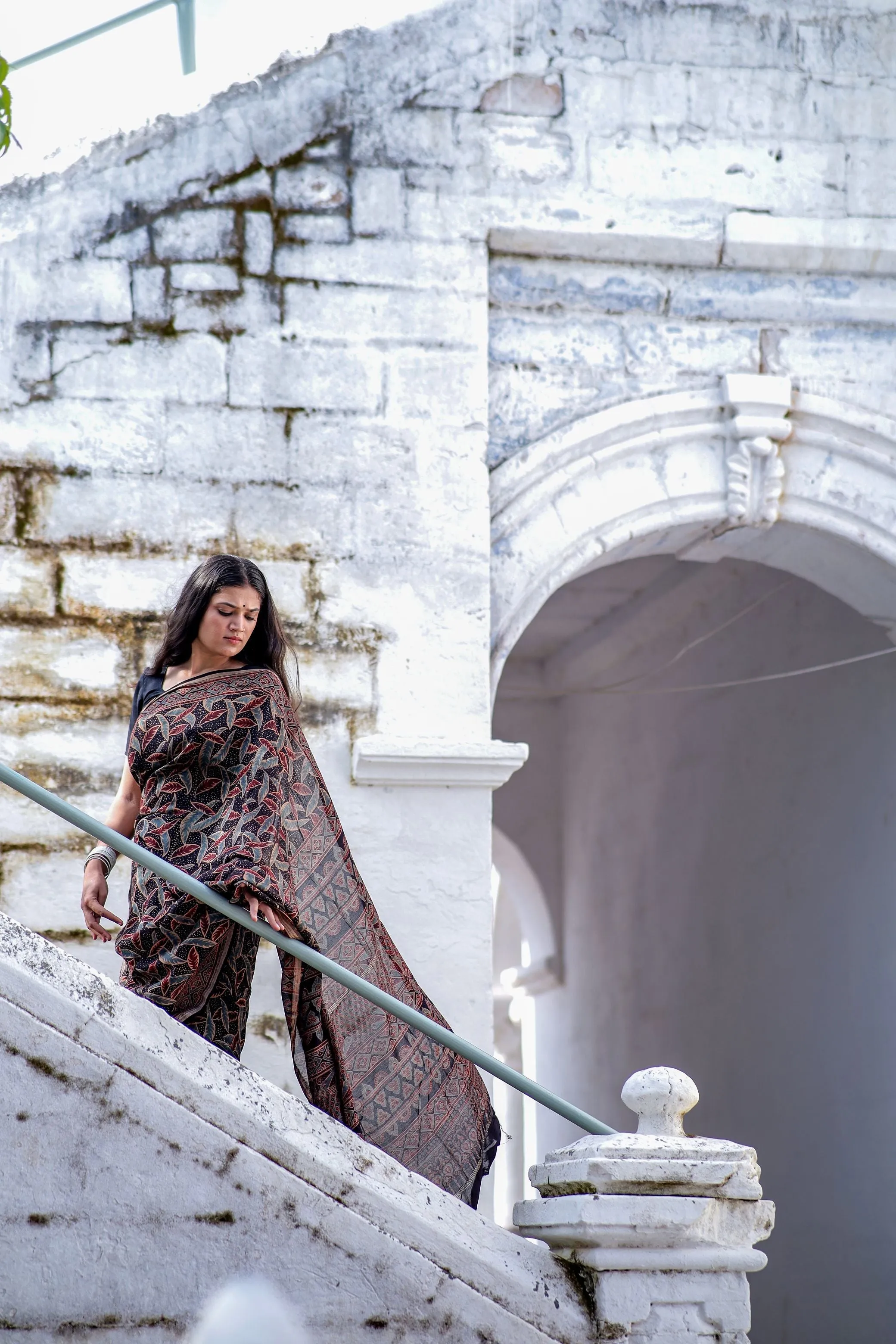A trsyt with Ajrakh -Jharokha -Leaf Black chanderi ajrakh saree