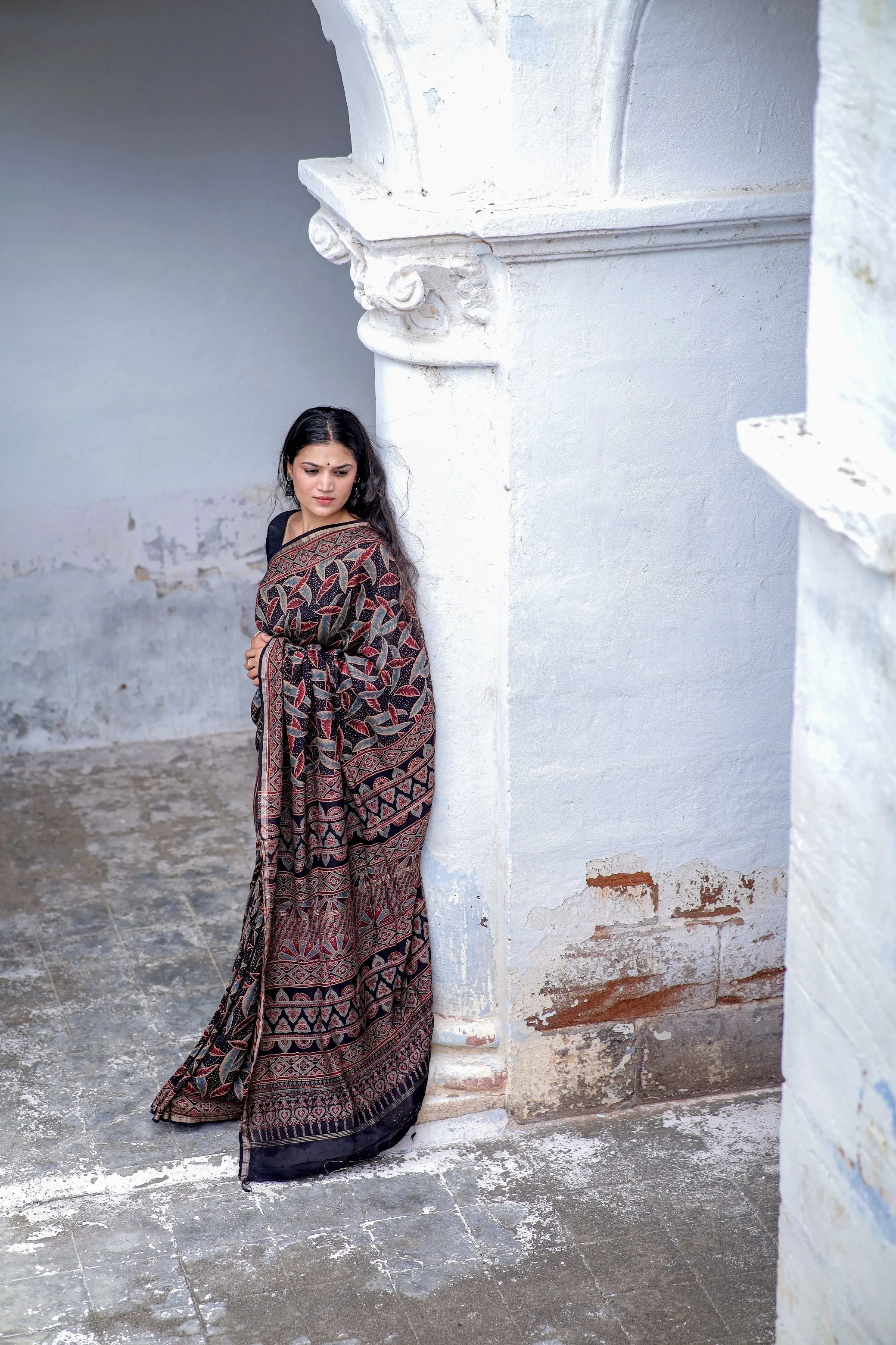 A trsyt with Ajrakh -Jharokha -Leaf Black chanderi ajrakh saree