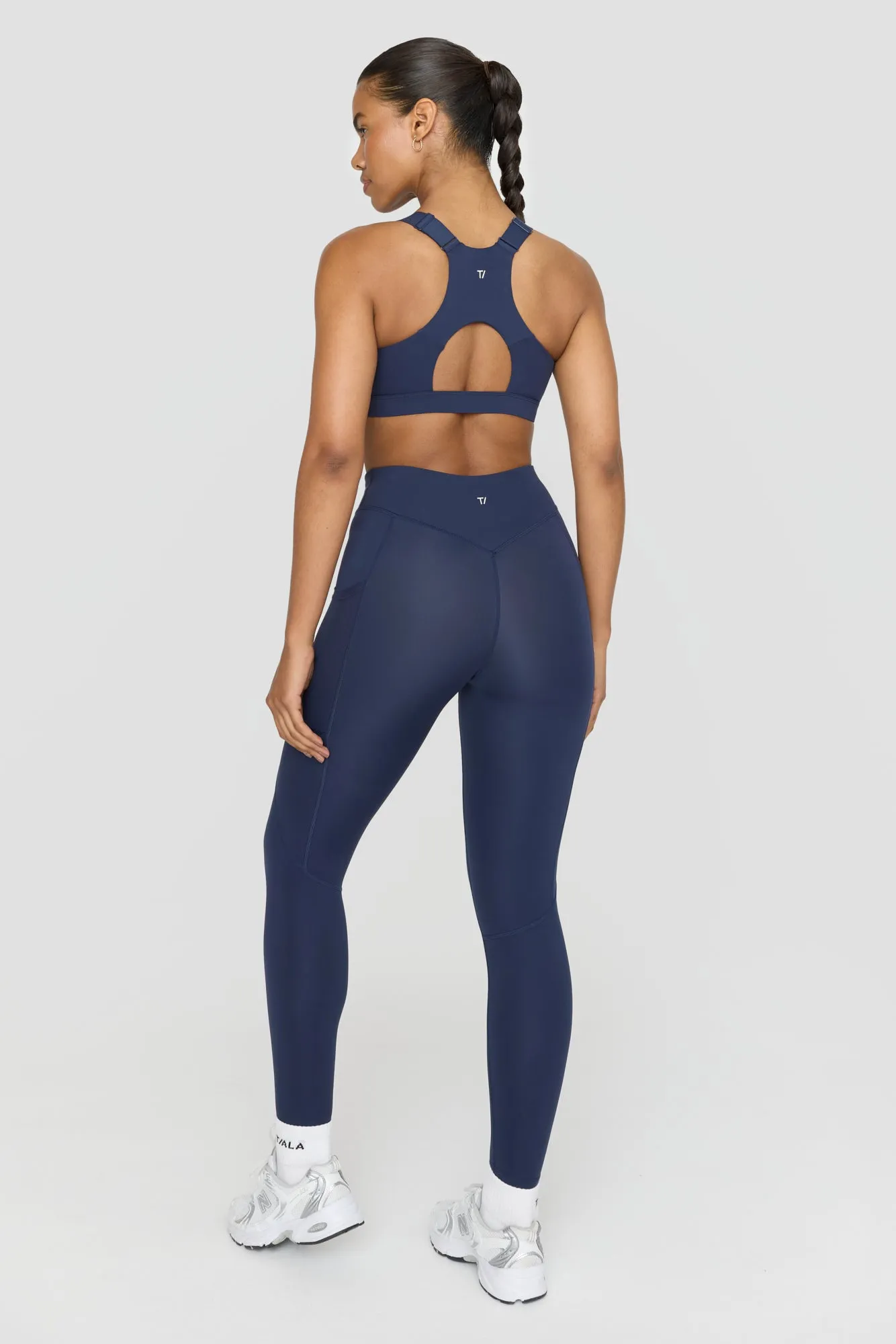 FORMTECH ZIP FRONT OPEN BACK SPORTS BRA - NAVY