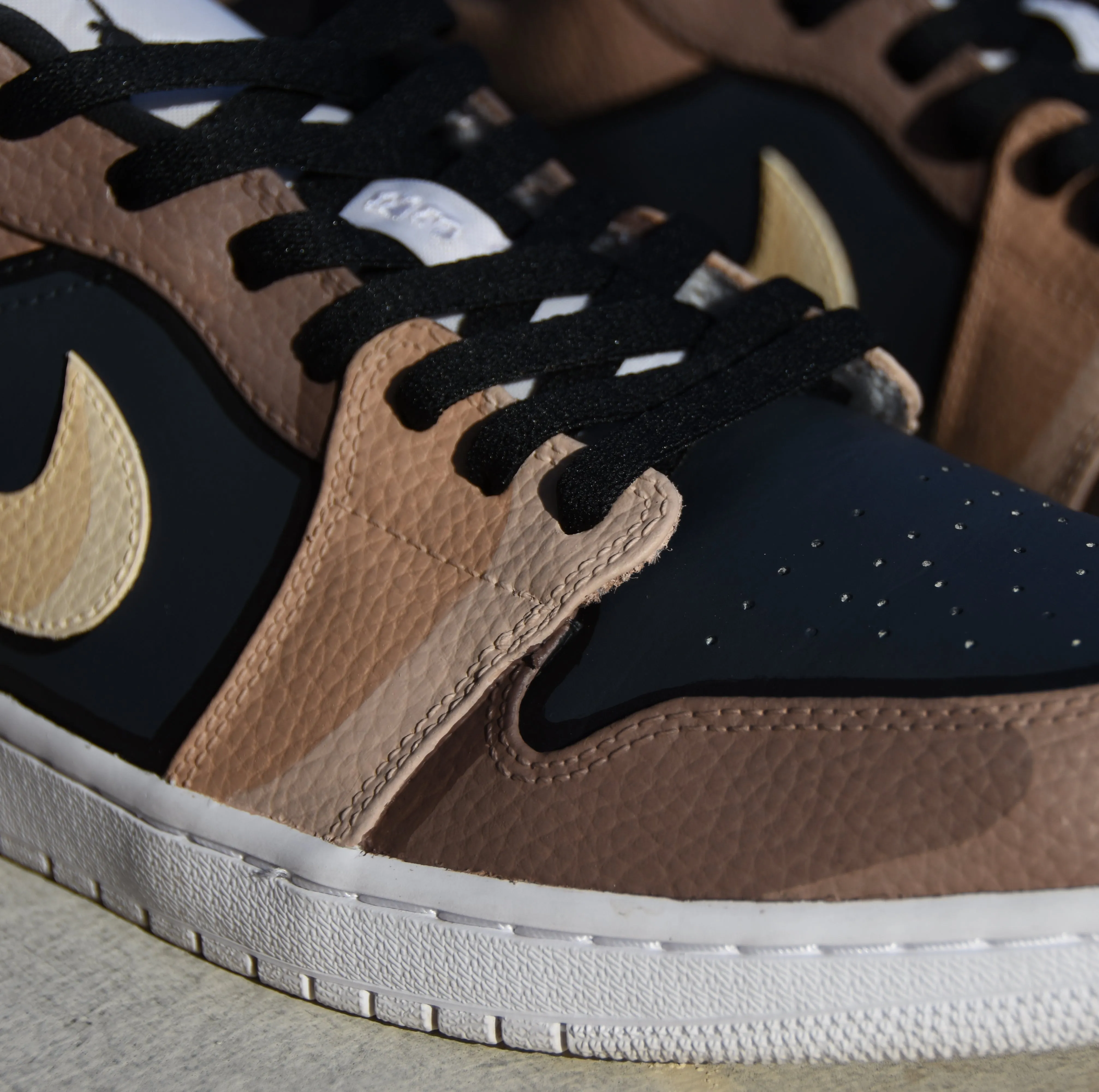 Tan Cartoon Jordan 1 Lows